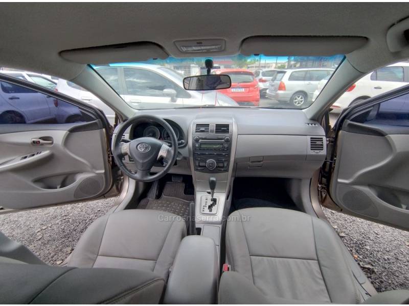 TOYOTA - COROLLA - 2009/2010 - Bege - R$ 56.900,00