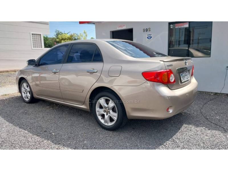TOYOTA - COROLLA - 2009/2010 - Bege - R$ 56.900,00