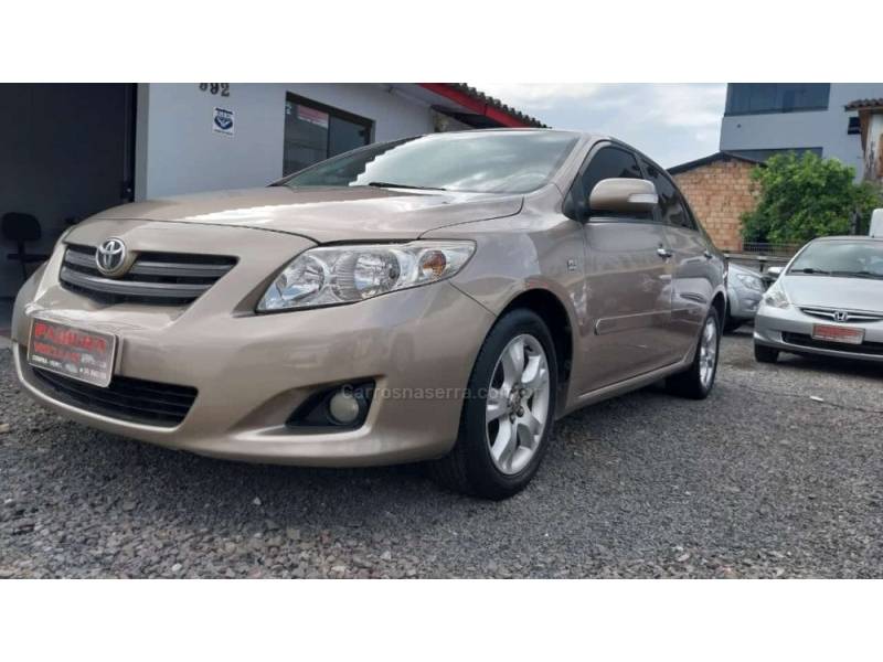 TOYOTA - COROLLA - 2009/2010 - Bege - R$ 56.900,00